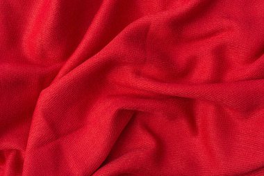 Buruşmuş pembe kumaş dokusu arkaplanı kapat