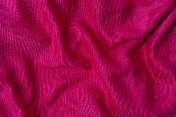 Pognieciony różowy tkanina tekstury tło zbliżenie — Zdjęcie stockowe