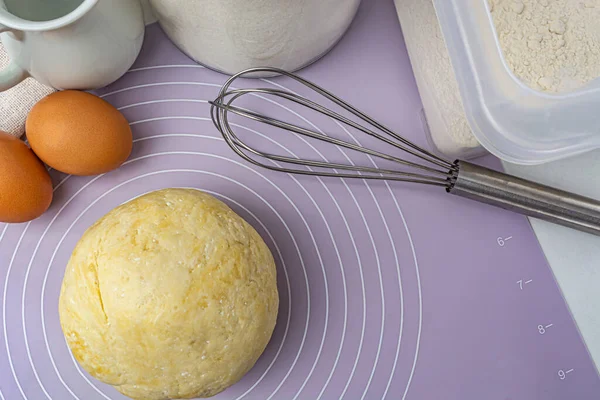 Ingredients for baking on the kitchen table. The process of making tarte. High quality photo