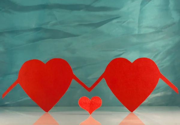 Three hearts on a light background — Stock Photo, Image