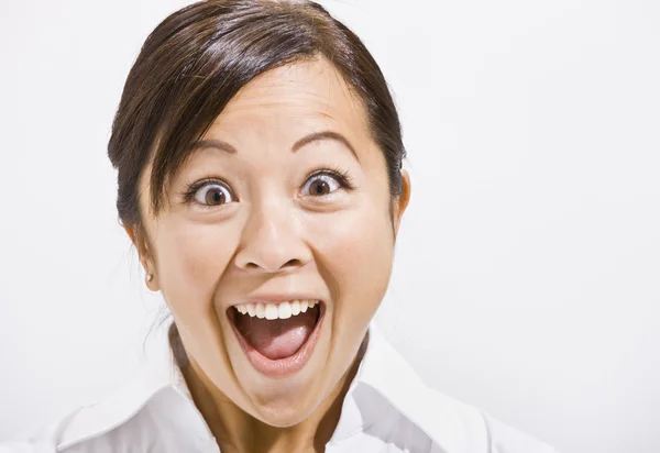 Asiatisk kvinna med en förvånad blick. — Stockfoto
