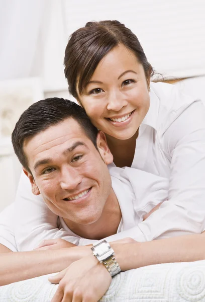 Attractive Couple Hugging and Smiling at the Camera — Stock Photo, Image
