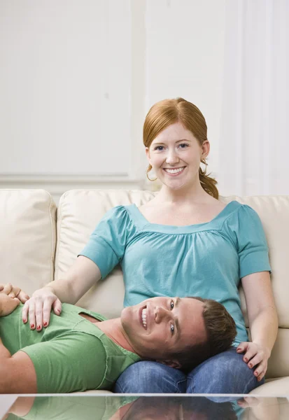 Couple Relaxing on Couch Together. — Stock Photo, Image