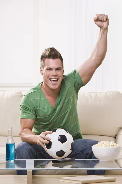 Soccer Fan Pumping His Fist While Watching the Game — Stock Photo, Image