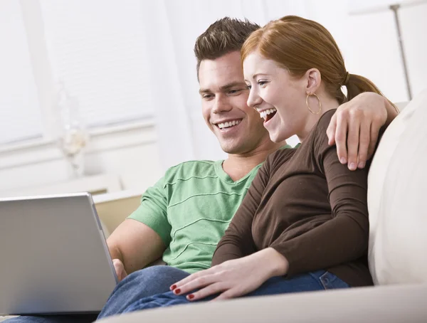 Couple Viewing Laptop — Stock Photo, Image