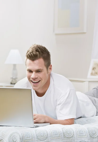 Man Laughing at Laptop — Stock Photo, Image