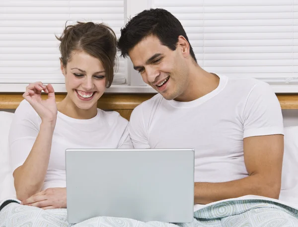 Couple Viewing Laptop Royalty Free Stock Images