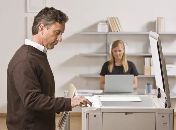 Man Making Copies — Stock Photo, Image