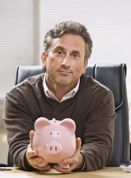 Man Holding Piggy Bank — Stock Photo, Image