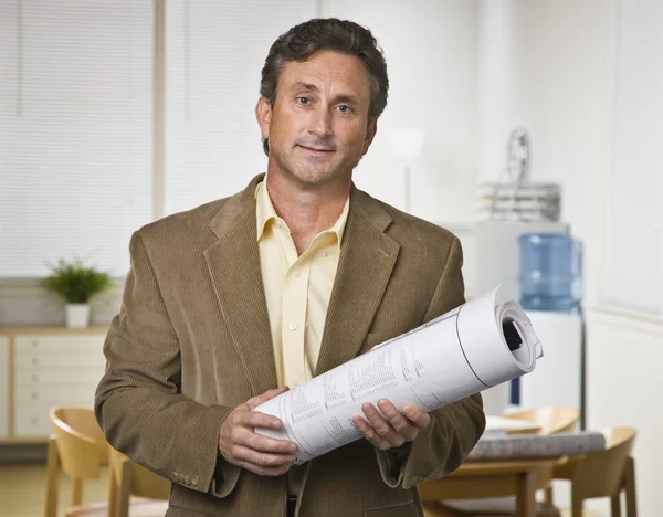 Man Holding Blueprints — Stock Photo, Image