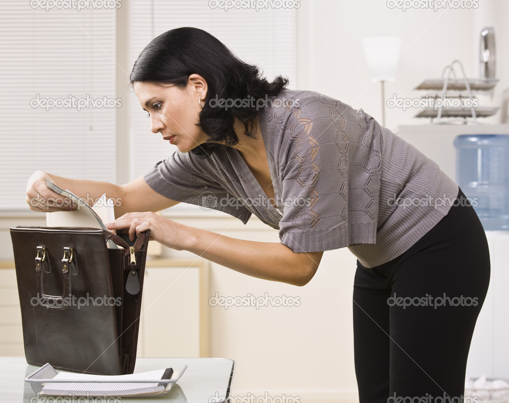 Woman Looking at File