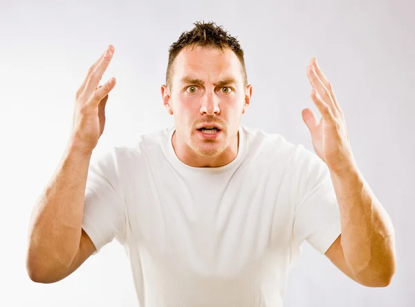 Man gesturing in surprise — Stock Photo, Image