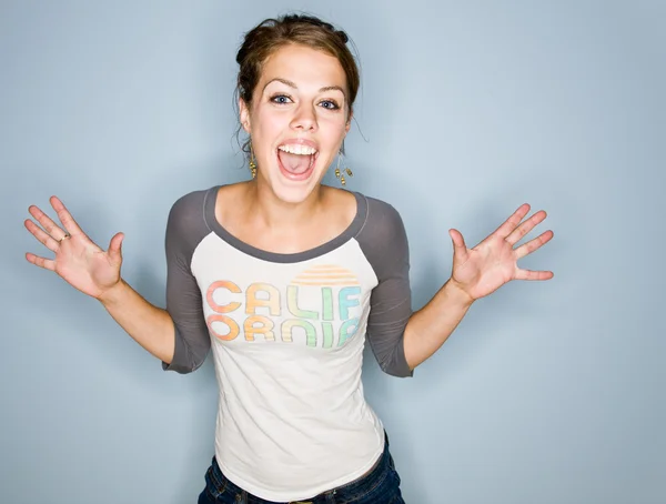 Shouting woman in jeans — Stock Photo, Image
