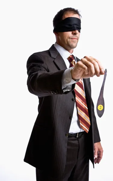 Businessman in blindfold with donkey tail — Stock Photo, Image