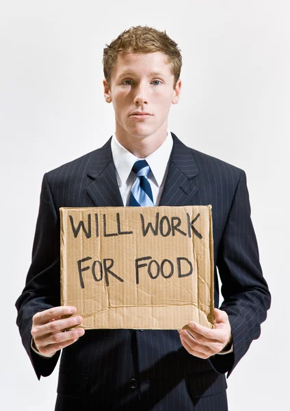 Businessman with sign ill work for food — Stock Photo, Image