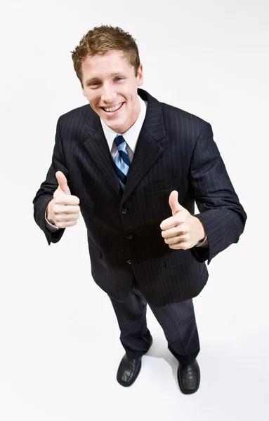 Empresário dando polegares até gesto — Fotografia de Stock