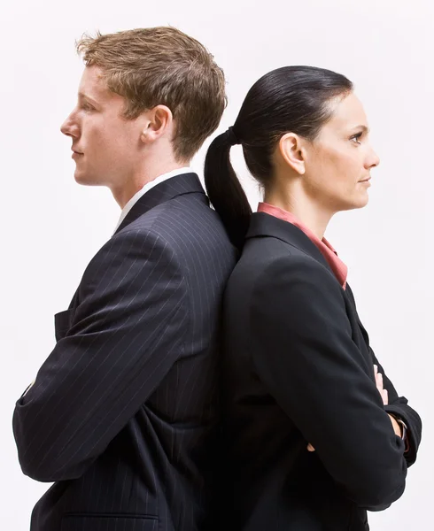 Business standing back to back — Stock Photo, Image