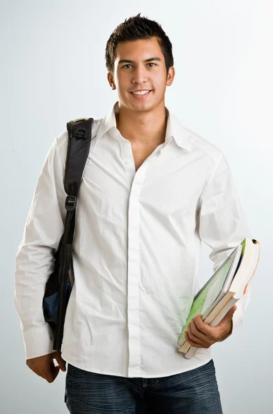 Man med ryggsäck och skolböcker — Stockfoto