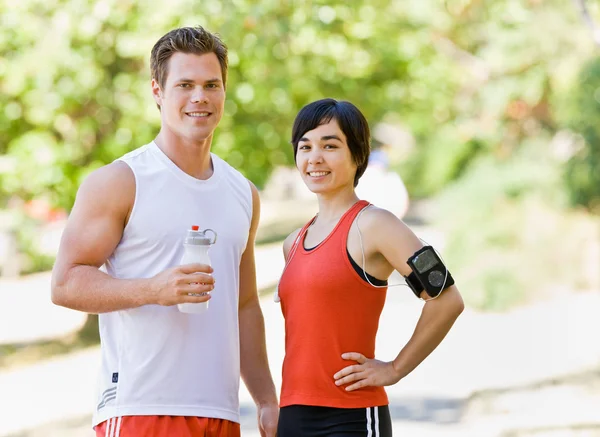 Runners drinking water — Stock Photo, Image