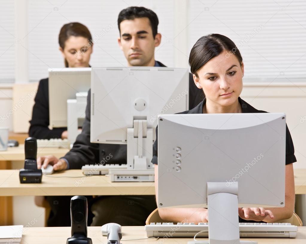Business working on computers