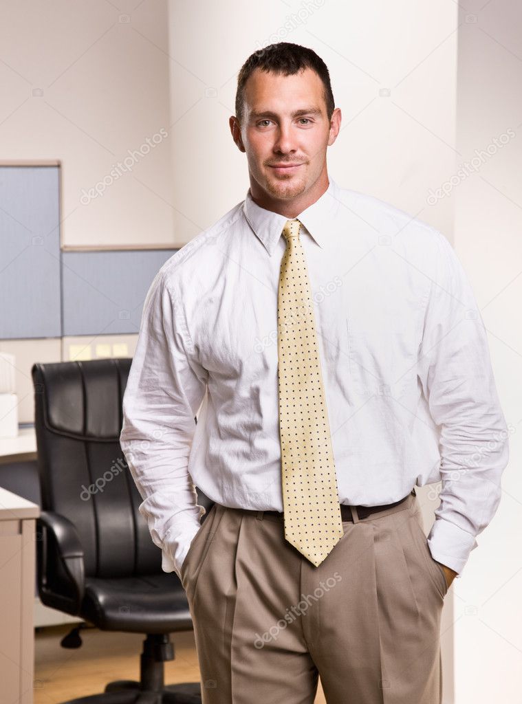 Businessman with hands in pockets