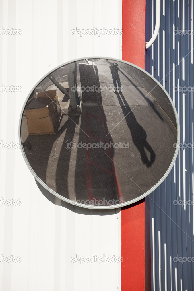 Traffic Mirror Mounted onWhite Metal Wall