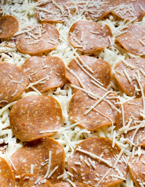 A Sheet of Uncooked Pepperoni Pizza — Φωτογραφία Αρχείου