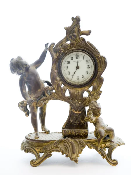 Relógio antigo com querubins em fundo branco — Fotografia de Stock