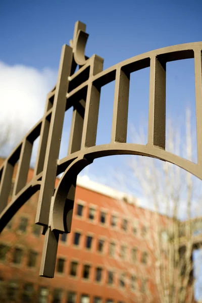 Gate, Brick Building, and Blue Sky — Stock Photo, Image