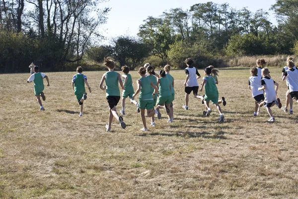 Cross Country Runners Leave the Starting Line — Stock Photo, Image