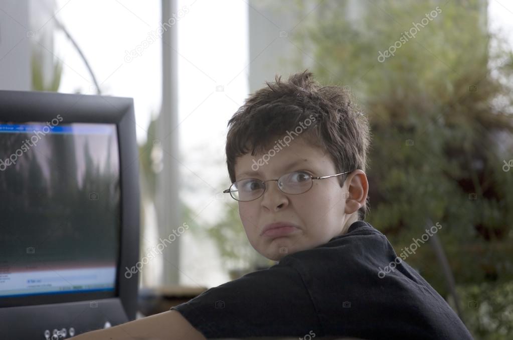 Middle School Boy Using a Computer