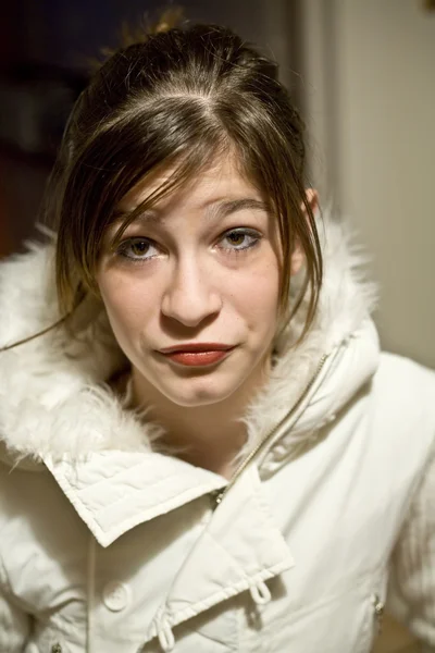 Girl in a White Coat and Too Much Make-Up — Stock Photo, Image