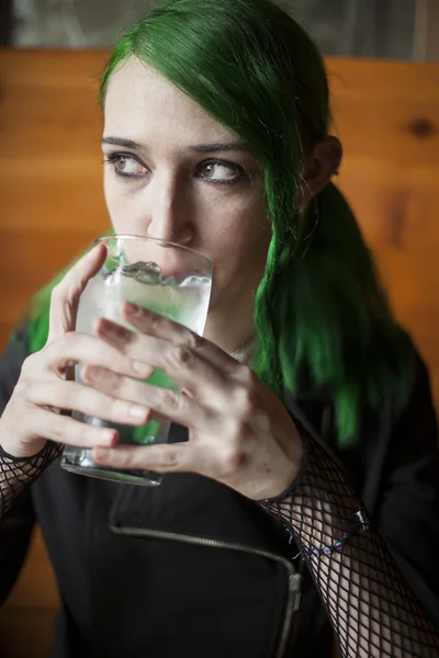 Young Woman with Beautiful Green Hair and Eyes Drinking Water — Stock Photo, Image