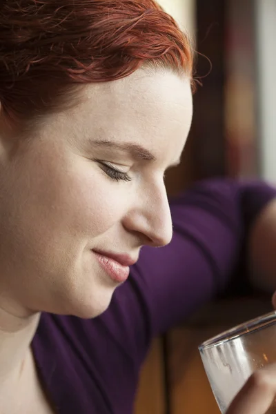 Young Woman with Beautiful Auburn Hair Drinking Water — Stock Photo, Image