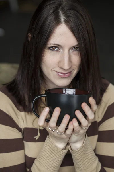 Beautiful Young Woman with Brown Hair and Eyes Holding Black Cof — Stock Photo, Image