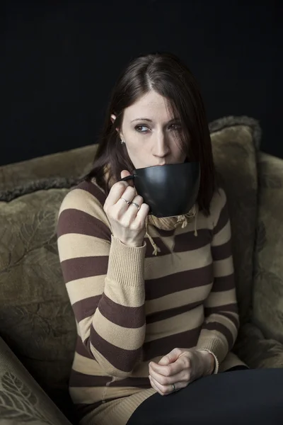 Beautiful Young Woman with Brown Hair and Eyes Holding Black Cof — Stock Photo, Image