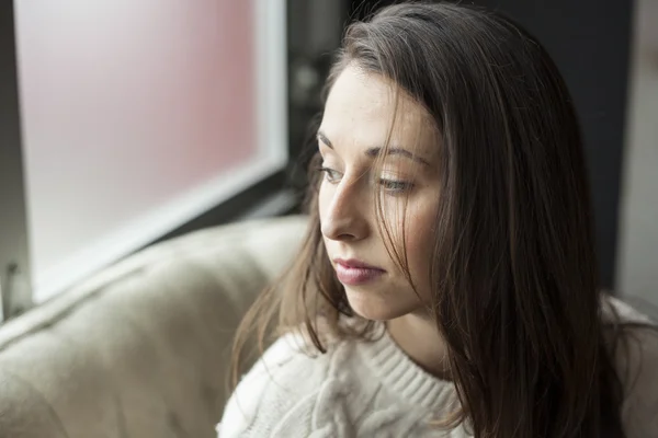 Beautiful Young Woman with Brown Hair and Eyes Thinking — Stock Photo, Image