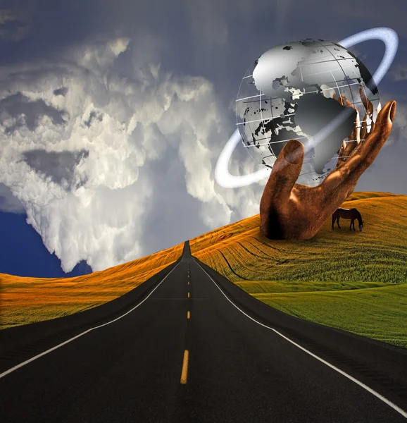 Road and hand sculpture — Stock Photo, Image