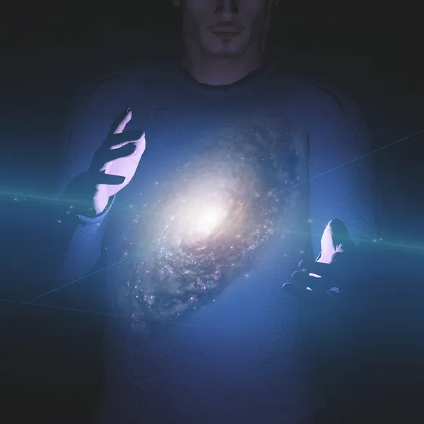 Człowiek trzyma galaktykę między rękami. — Zdjęcie stockowe