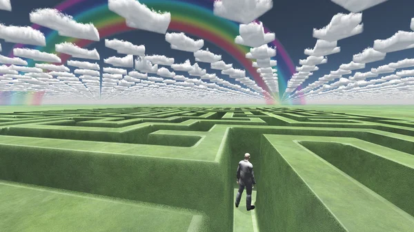 Man in doolhof met puzzel wolken — Stockfoto