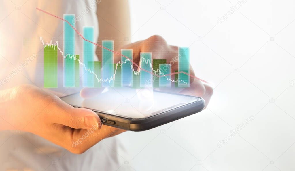 Growth chart positive indicators in business, smartphone in business, technology and the concept of people - a close-up of a female hand holding and showing a smartphone with a diagram on the screen