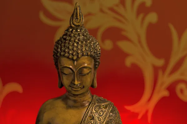 Buddha Head in Red Background Royalty Free Stock Images
