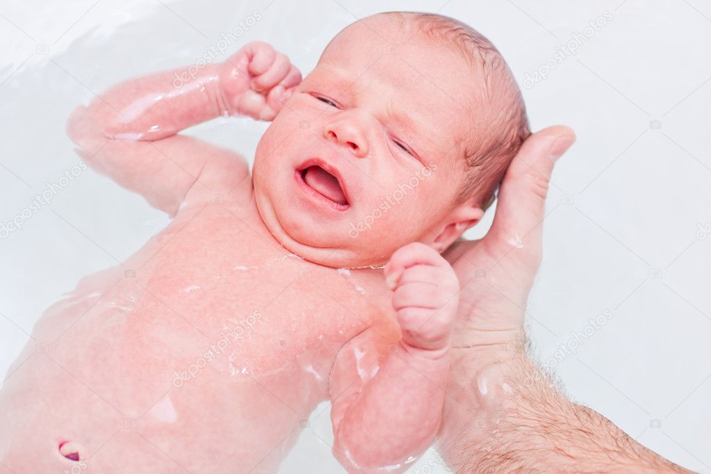 Bathing newborn — Stock Photo © marchibas 29967601