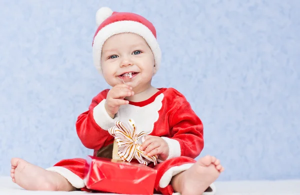 Cute baby boy santa helper — Stockfoto