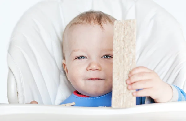 Boldog baba fiú eszik — Stock Fotó