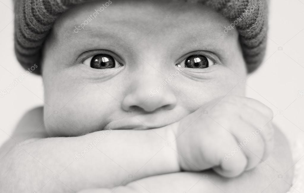 Cute baby boy with wide eyes 