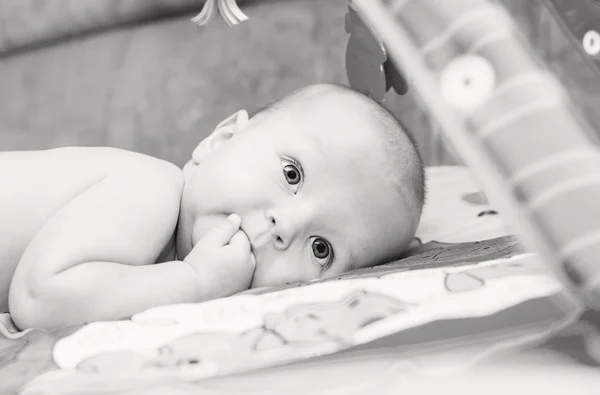 Little baby with finger in mouth — Stock Photo, Image