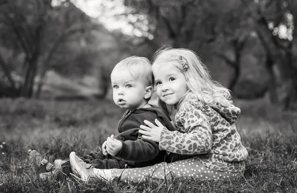 Cute sister hugging brother — Stock Image Cute sister hugging brother Royalty Free Stock Photos