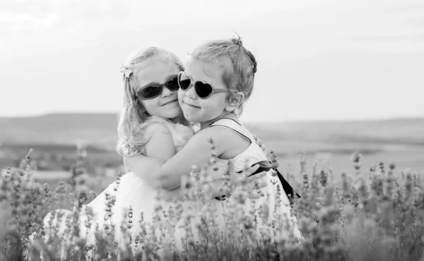 Two little girls hugging — Stock Photo, Image