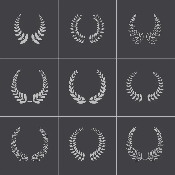 Conjunto de iconos de coronas de laurel negro vector — Archivo Imágenes Vectoriales